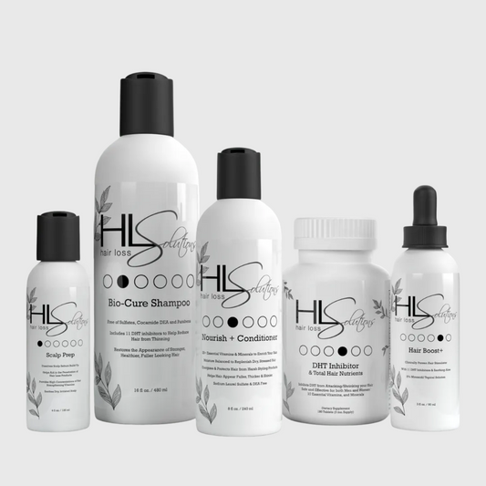 Set of HLS Solutions hair care products on a light gray background